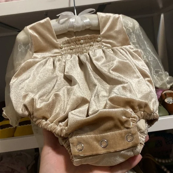 It’s not from Petit Maison Kids, romper 12-18 months.